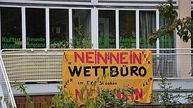 Bildtext: Banner zur Aktion am Stadtteilladen. Foto: QM Heerstraße