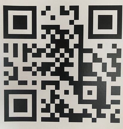Nahaufnahme eines QR-Codes, der zur „kiezinfo“-App führt.