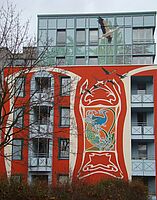 Soziales Kunstprojekt: Fassadenmalerei "Die Voliere"